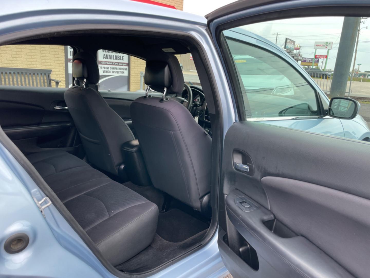 2014 Blue Chrysler 200 (1C3CCBAB0EN) with an 4-Cyl, 2.4 Liter engine, Automatic, 4-Spd transmission, located at 8008 Warden Rd, Sherwood, AR, 72120, (501) 801-6100, 34.830078, -92.186684 - Photo#9